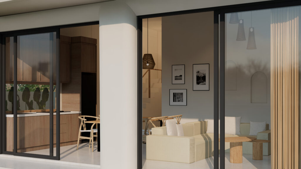 Modern living room with open kitchen and decor.