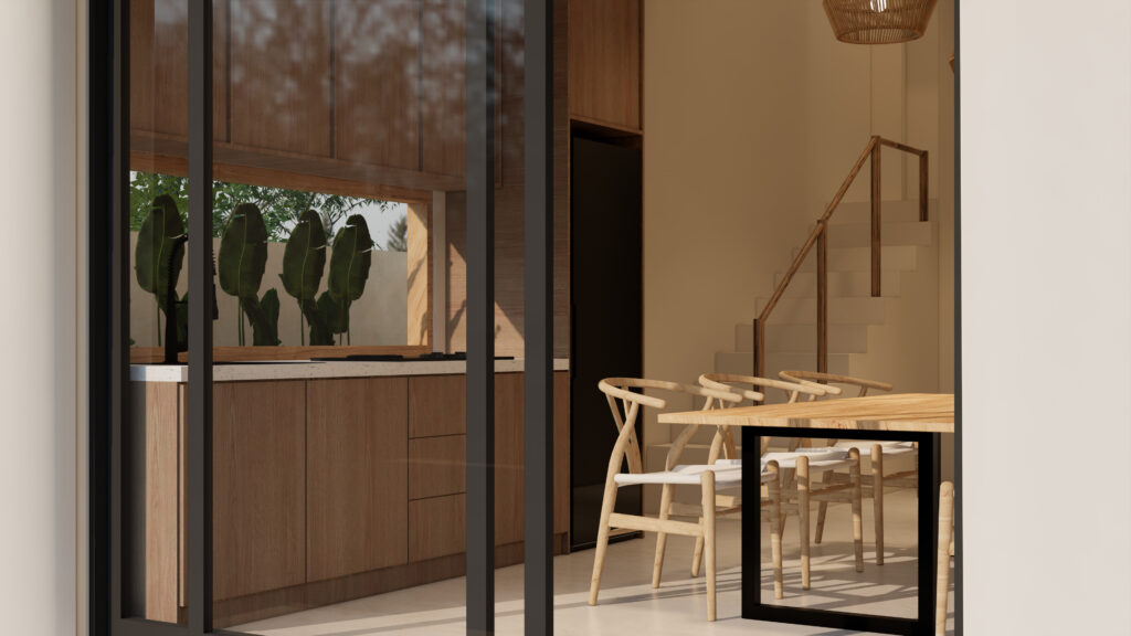 Modern kitchen dining area with stairs.