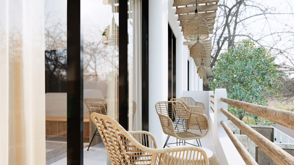 Outdoor balcony with wicker chairs and trees