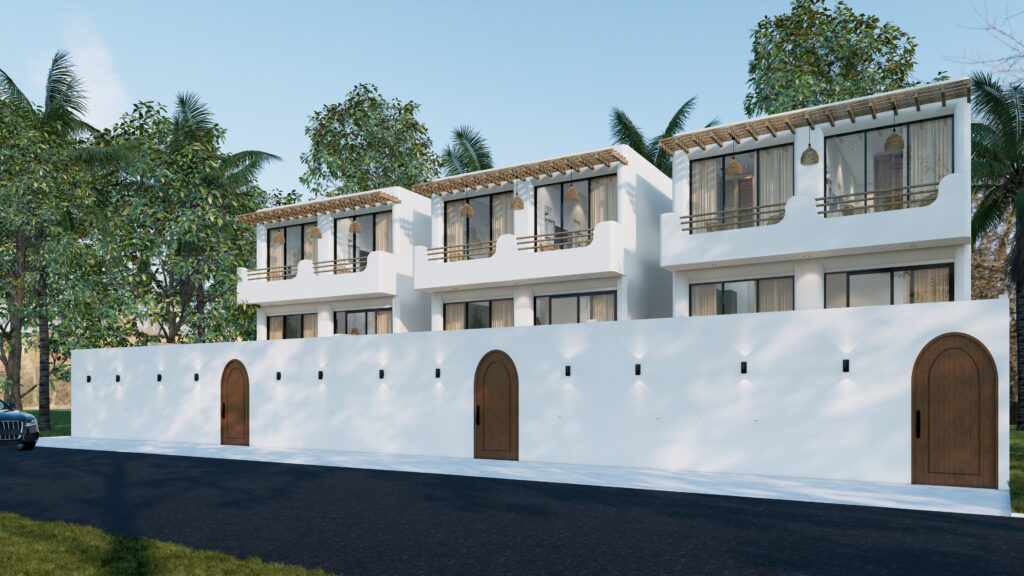 Modern white buildings with balconies and wooden doors.