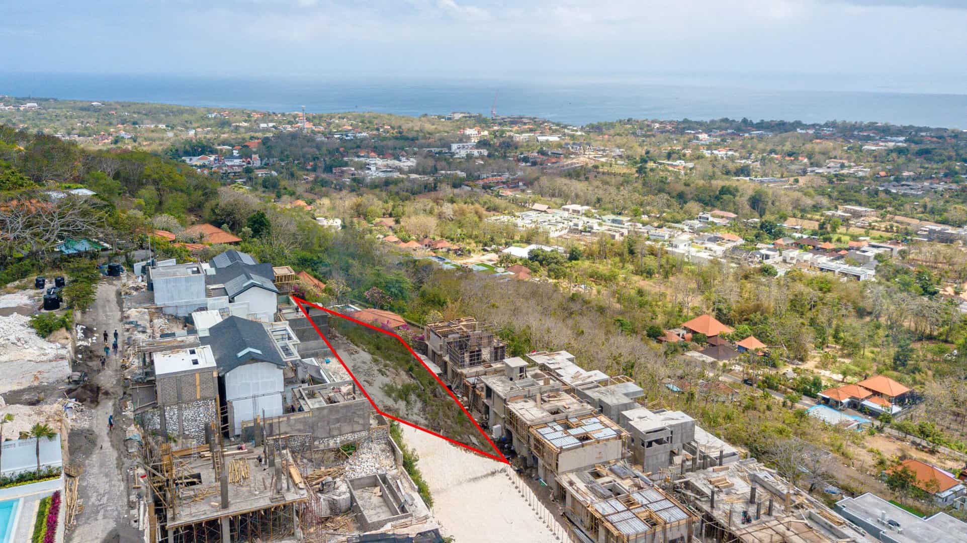 Aerial view of a construction site near the coast.