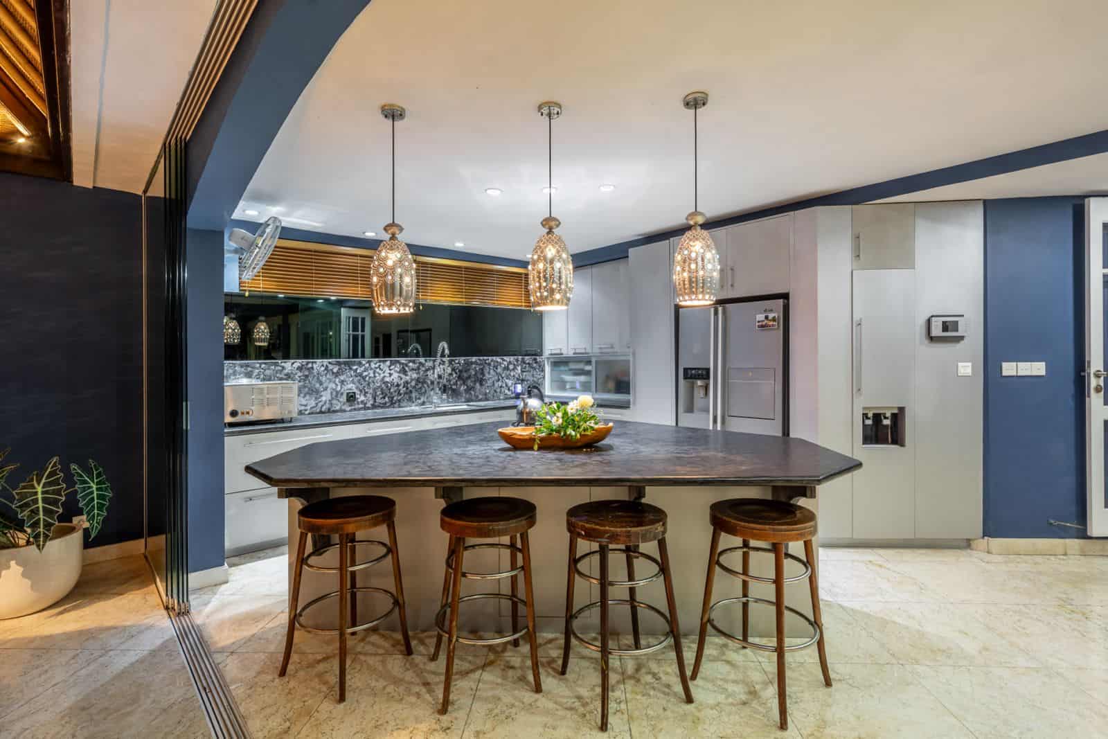Modern kitchen with island and pendant lights