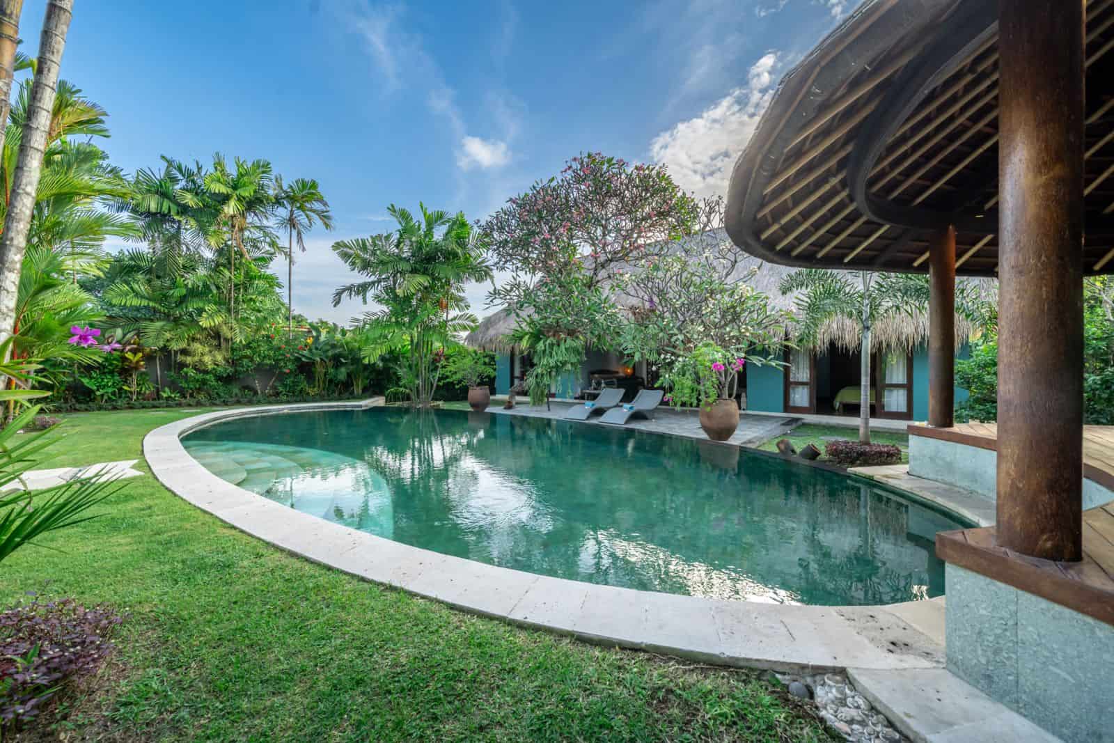 Tropical villa with luxury pool and lush garden