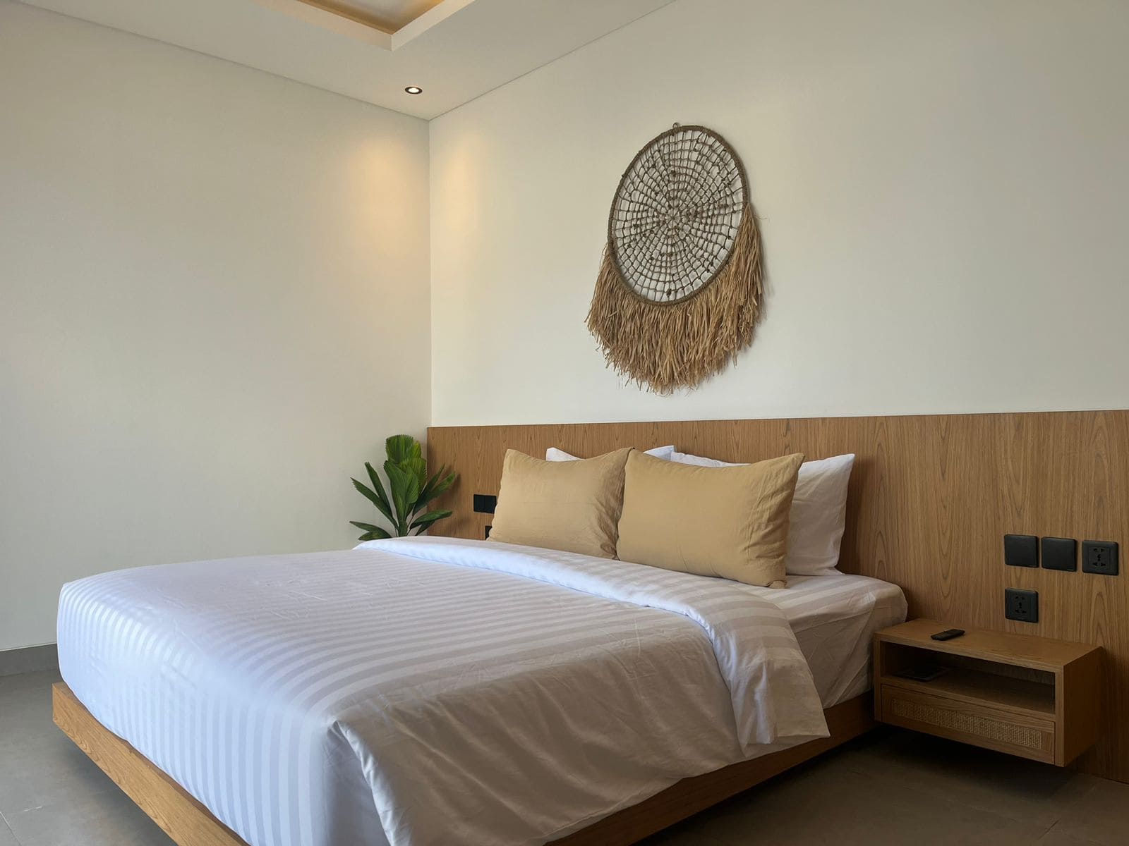 Modern bedroom with wooden accents and decor