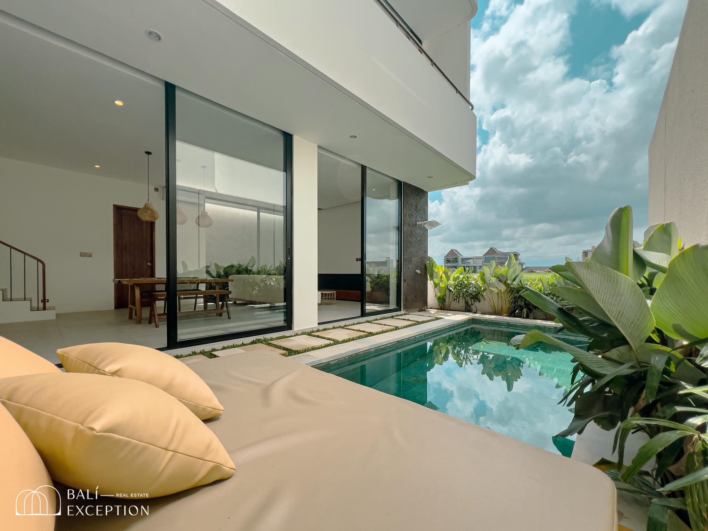 Modern villa with pool and greenery