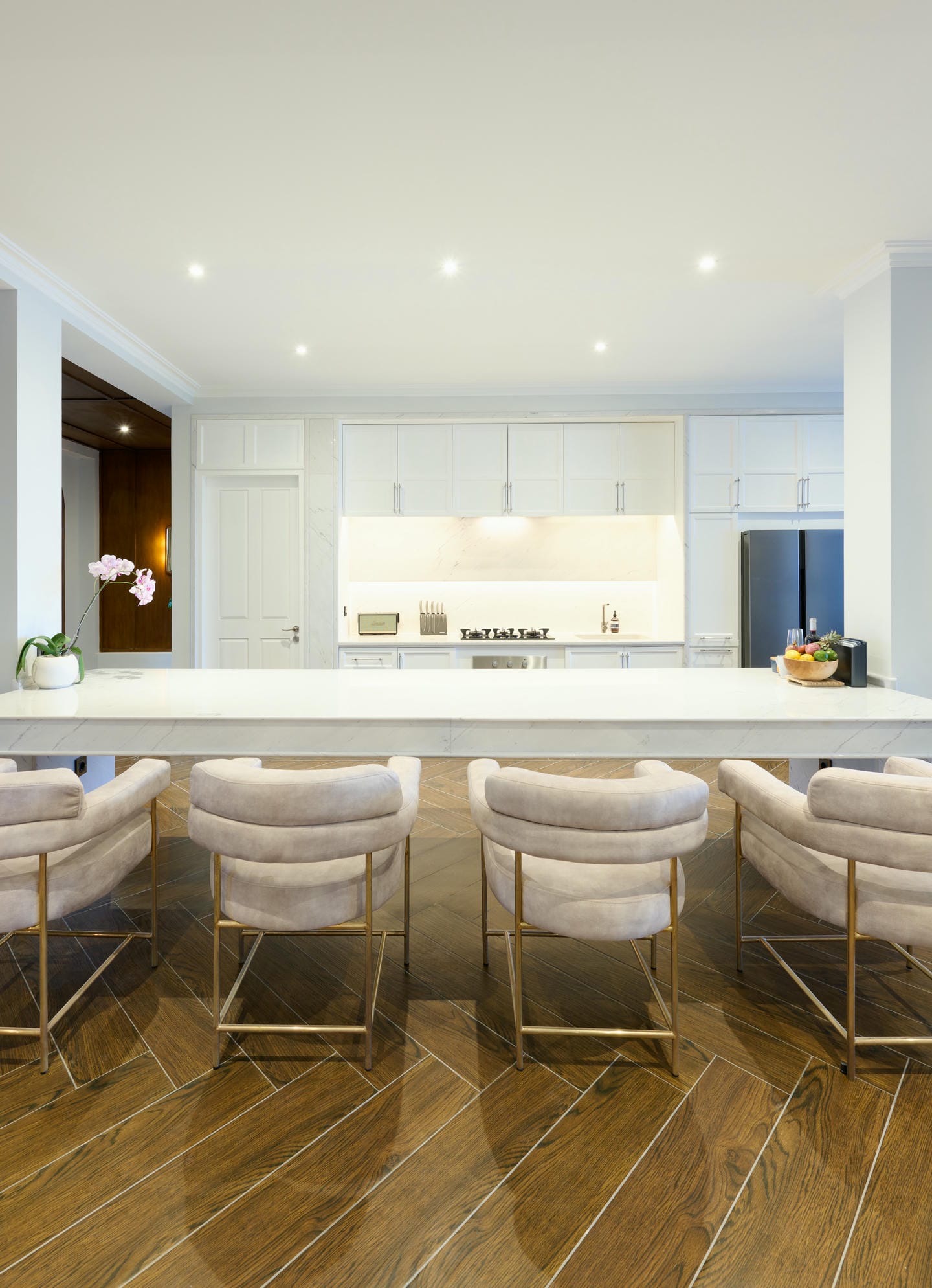 Modern kitchen with island and chairs