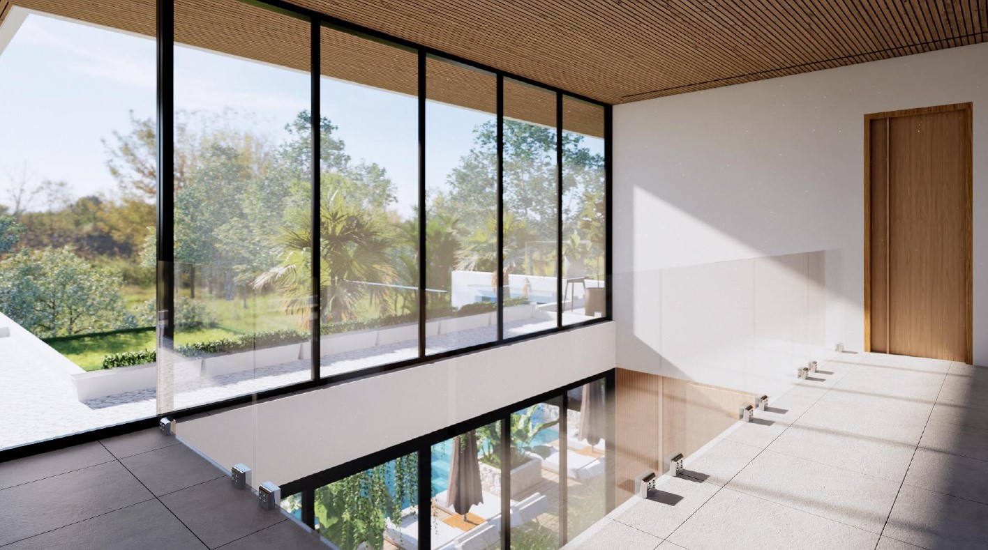 Modern interior with large window overlooking greenery.