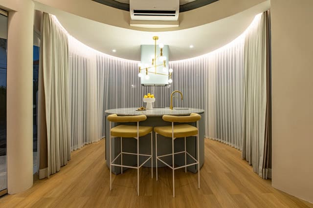 Modern kitchen with island and bar stools