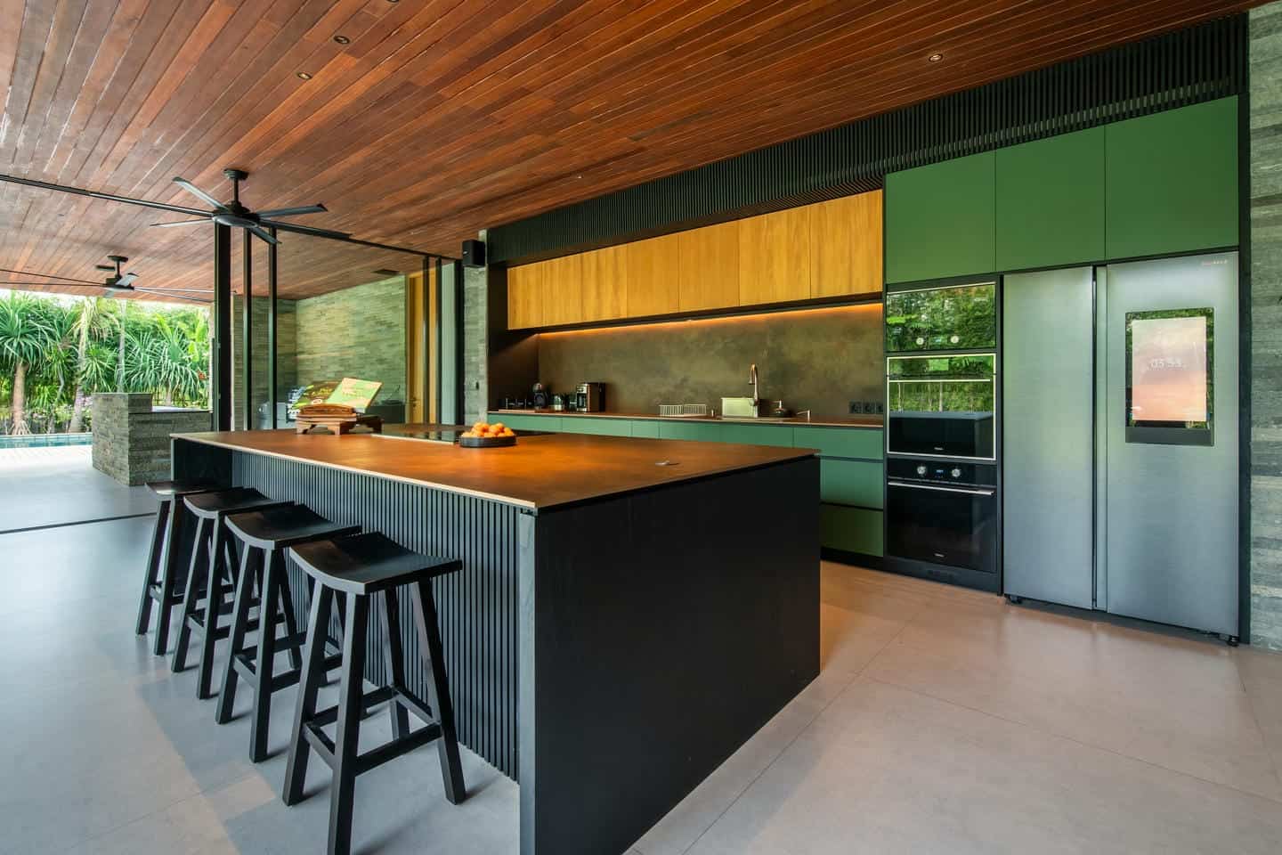 Modern kitchen with wooden accents and island.