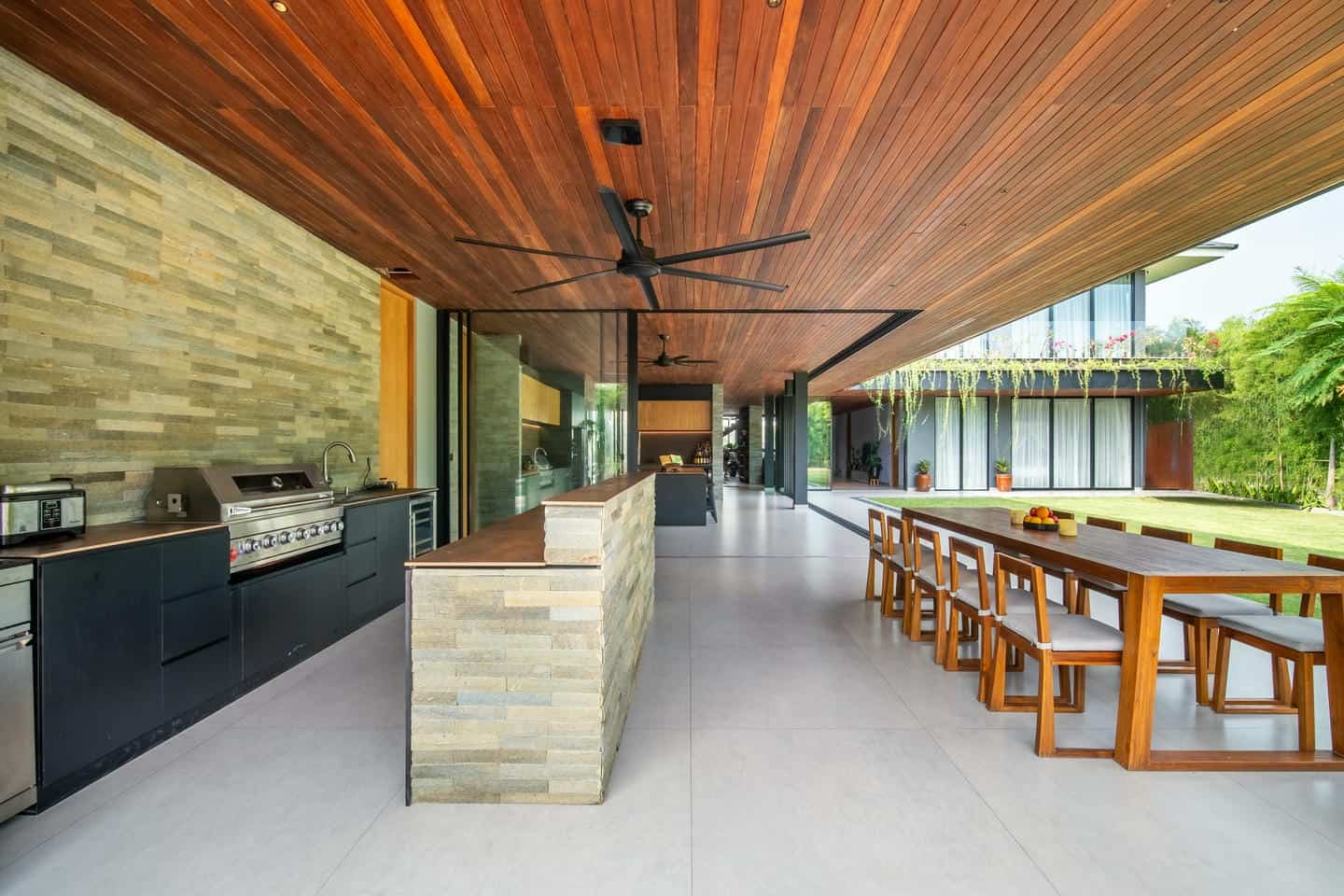 Modern outdoor kitchen and dining area