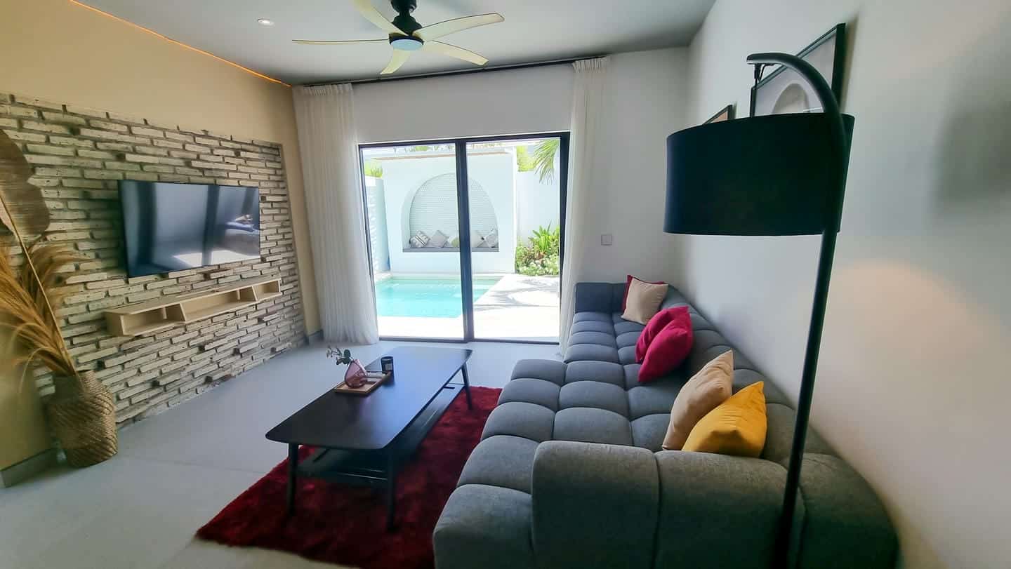Modern living room with pool view