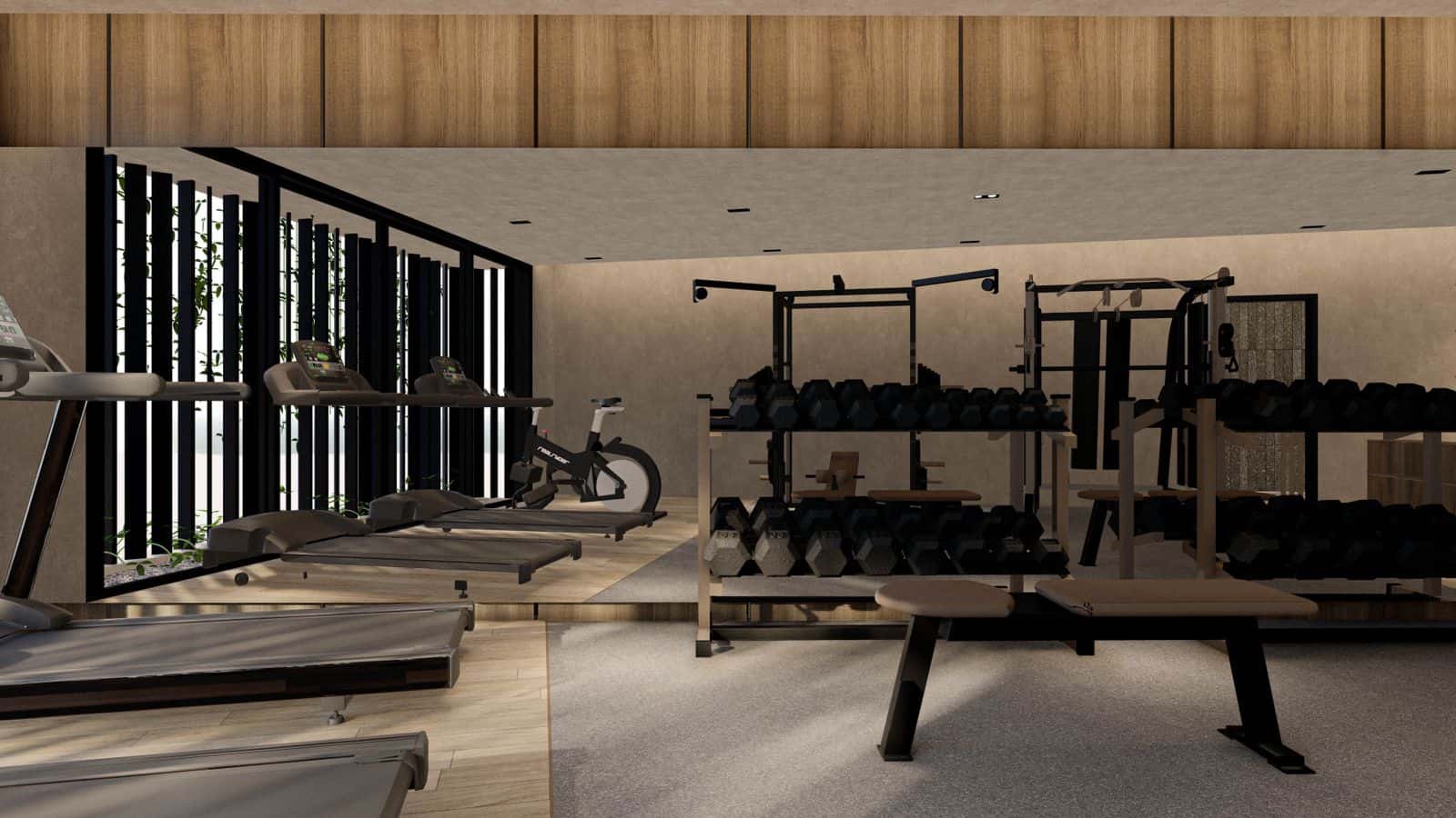 Modern gym with equipment and weights.