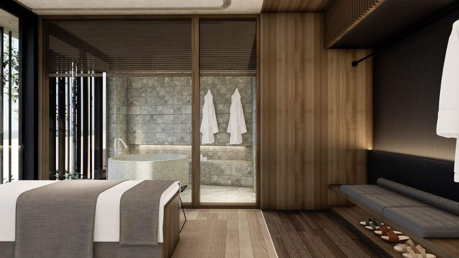 Luxury hotel room with spa and seating area.