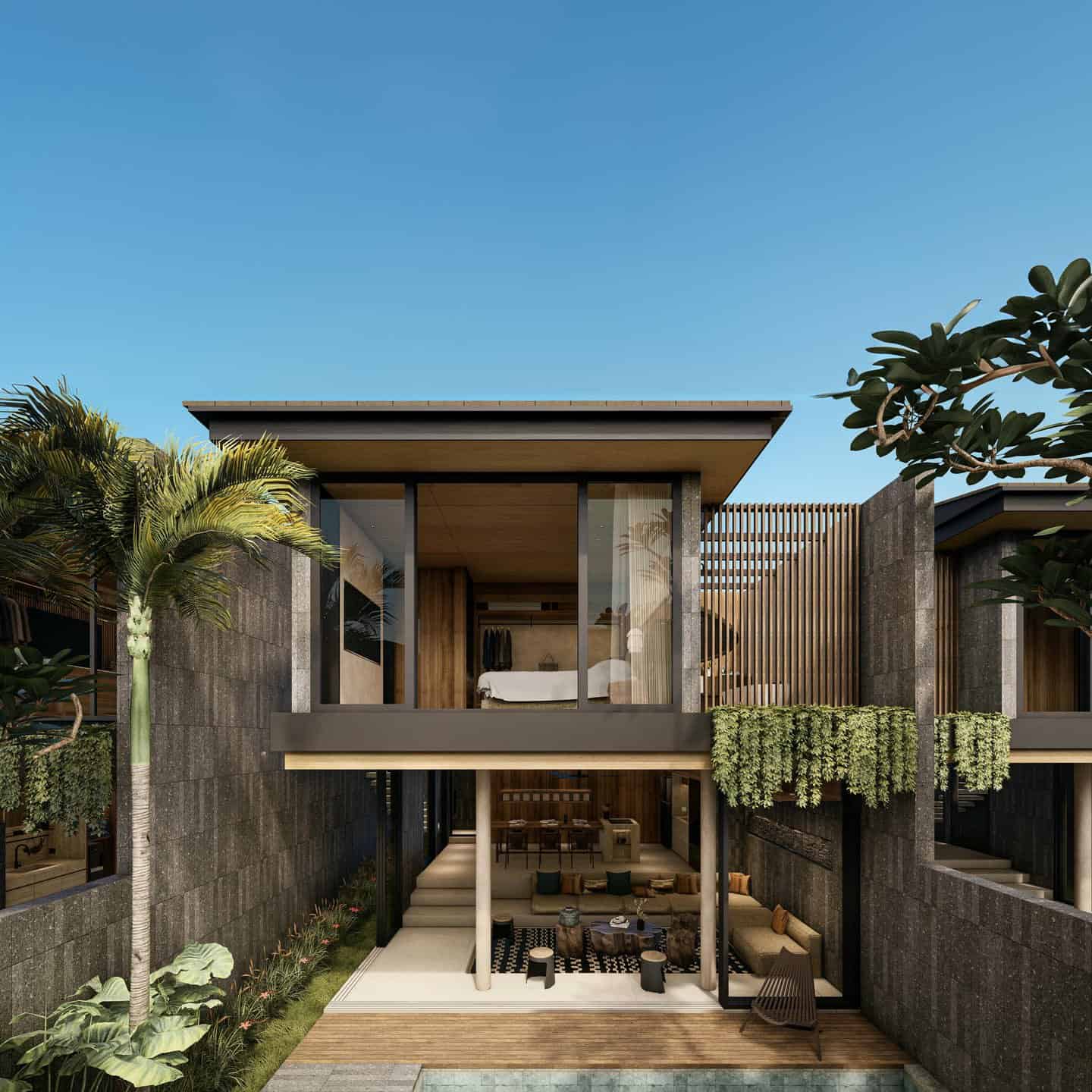 Modern house with glass walls and lush plants