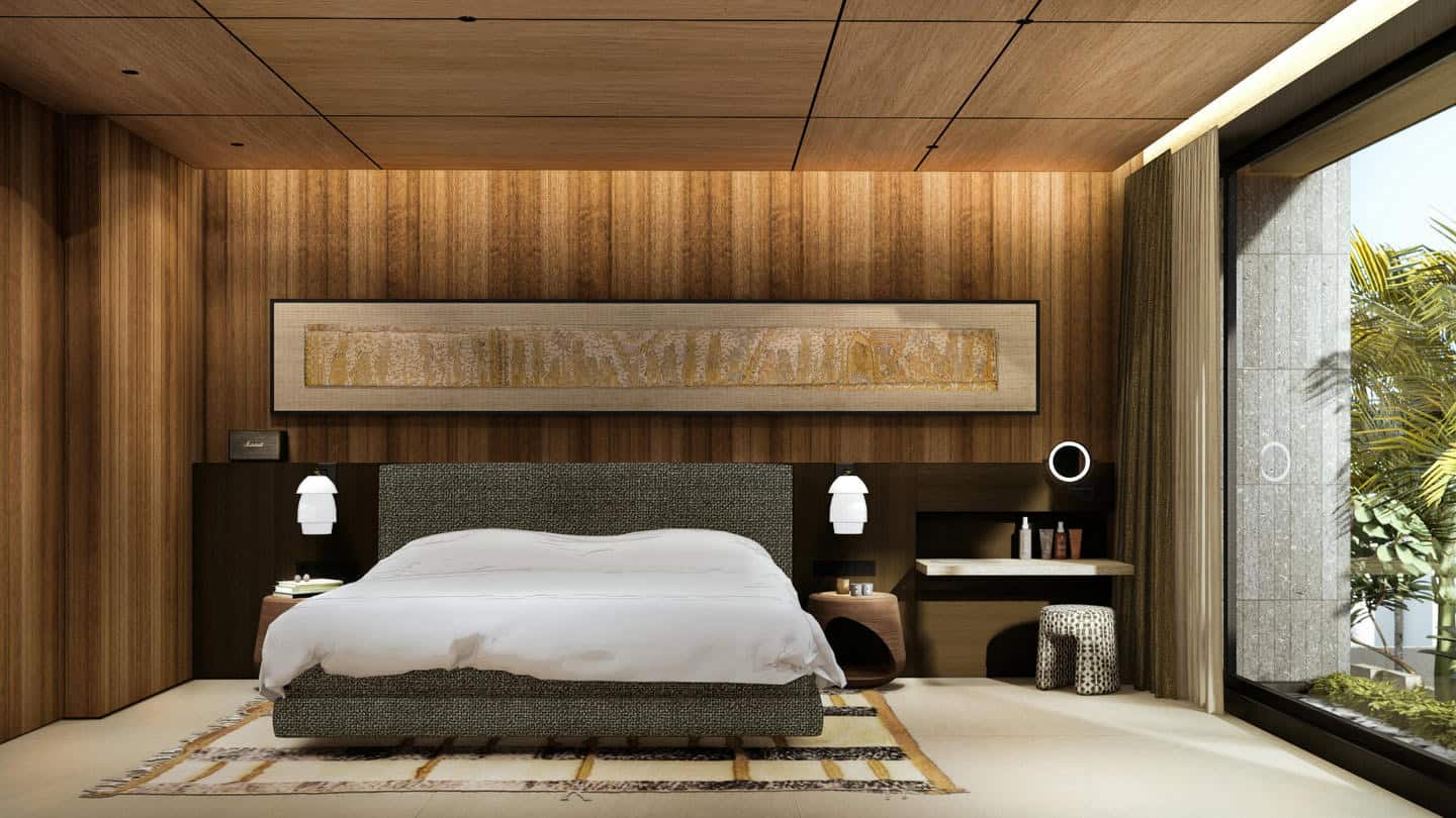Modern bedroom with wood paneling and art decor.