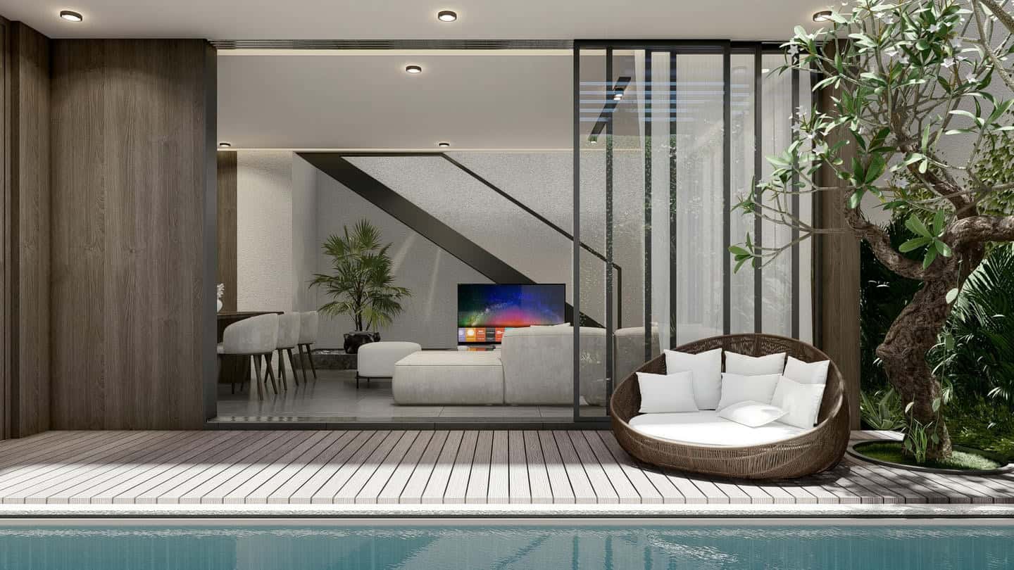 Modern living room with poolside view.