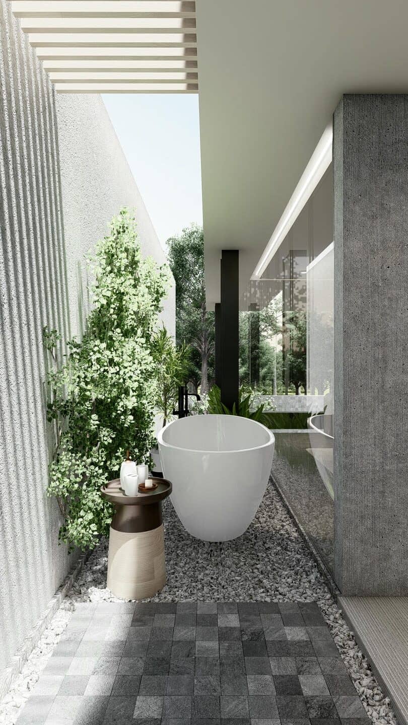 Outdoor bathroom with tub and plants