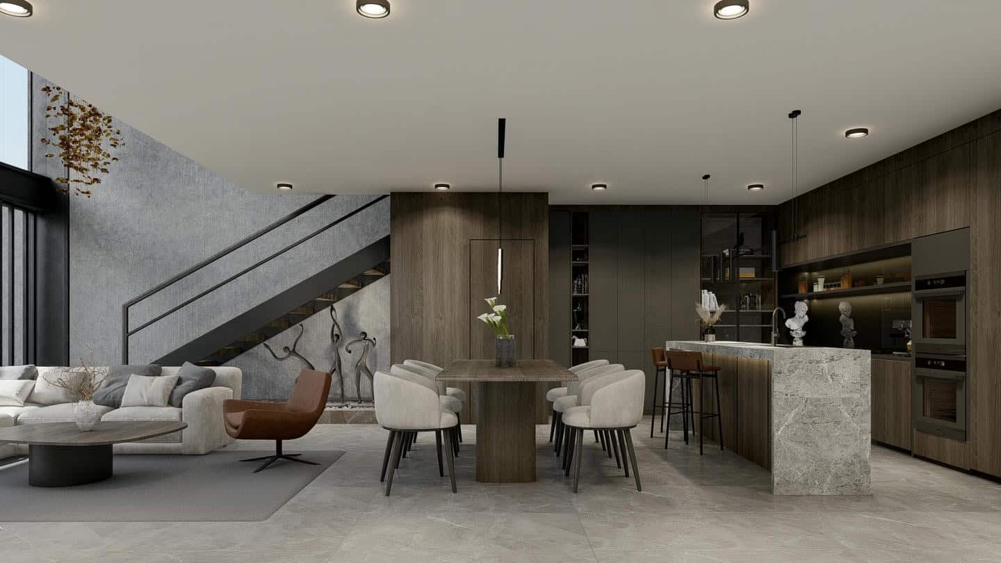 Modern kitchen and dining area with staircase view.