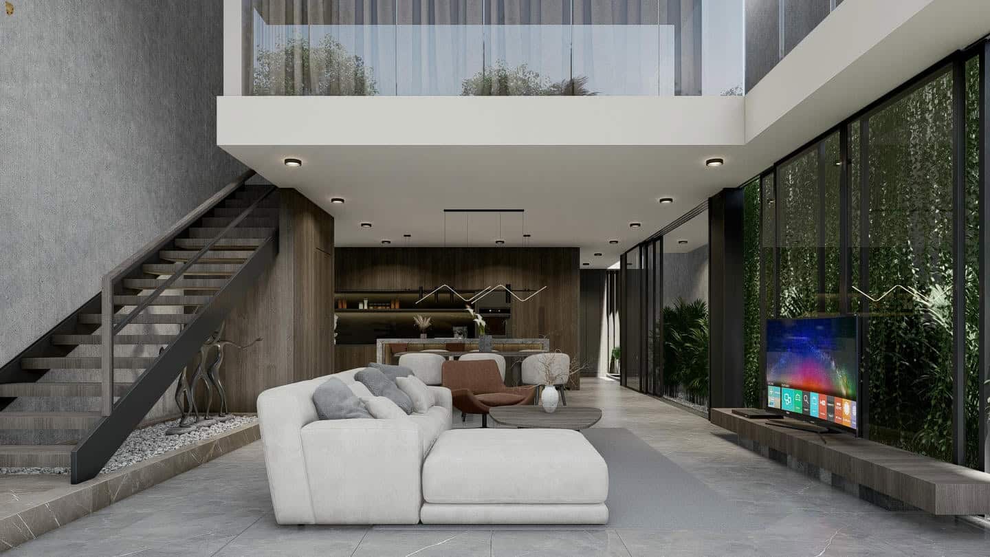 Modern living room with stairs and large windows