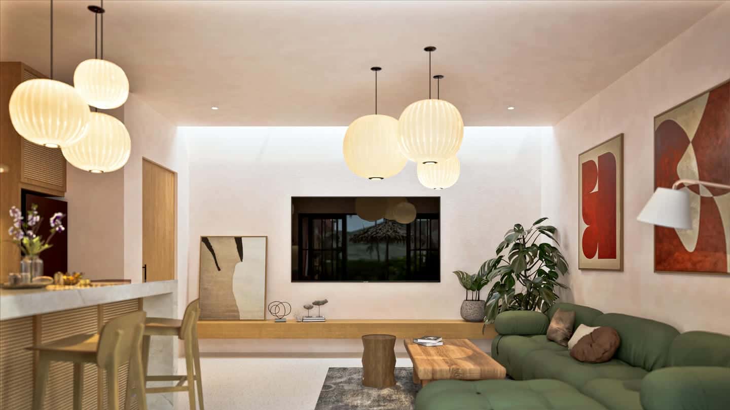 Modern living room with pendant lights and green sofa