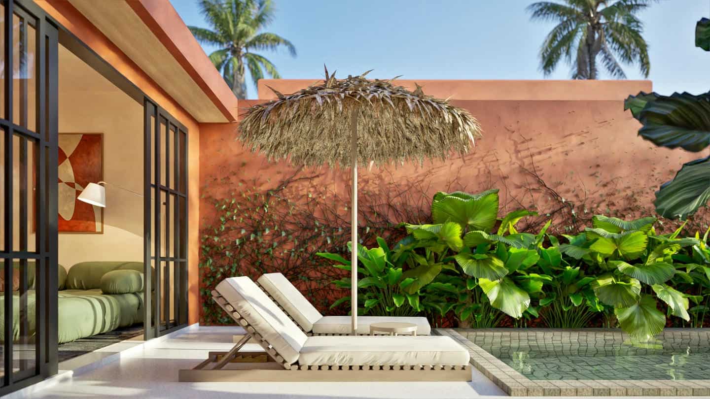 Tropical patio with lounge chairs, umbrella, and pool