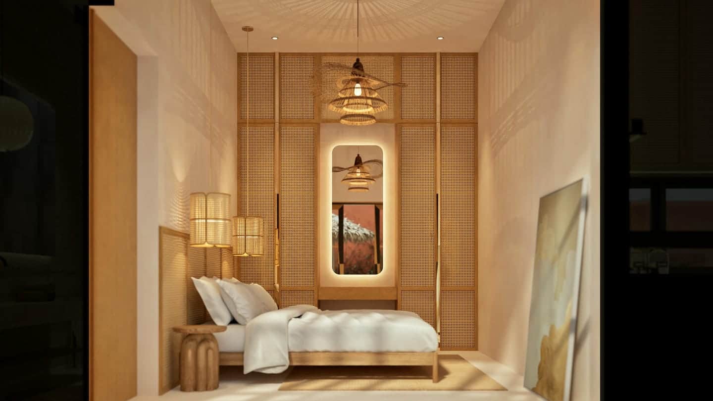 Minimalist bedroom with wooden decor and soft lighting.