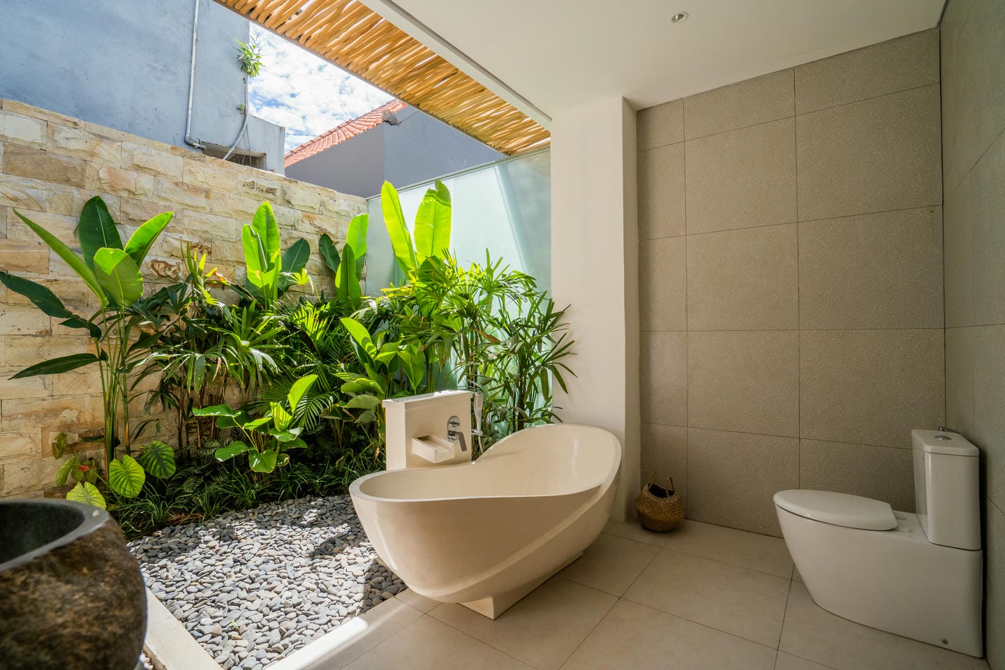 Modern bathroom with outdoor garden view