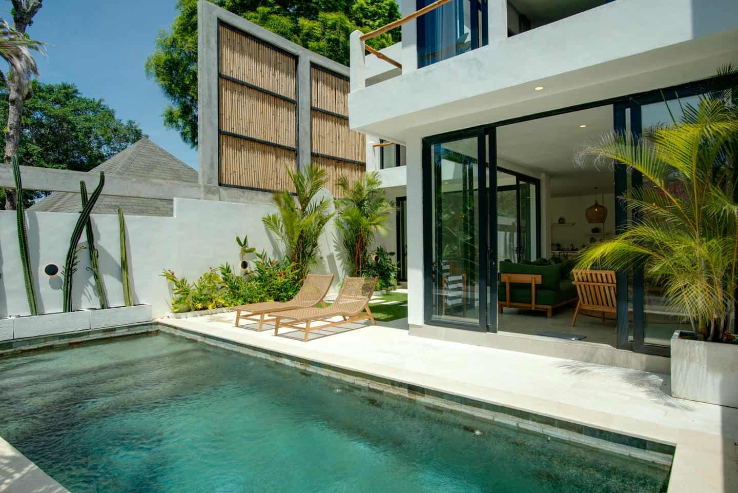 Modern house with pool and patio.