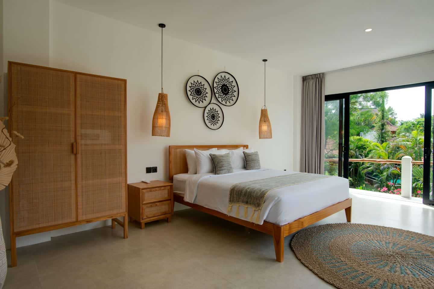 Modern bedroom with nature view and wooden furniture