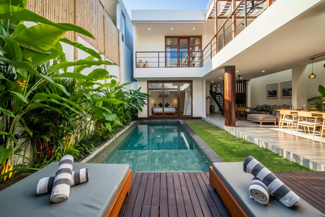 Modern villa with pool and tropical garden