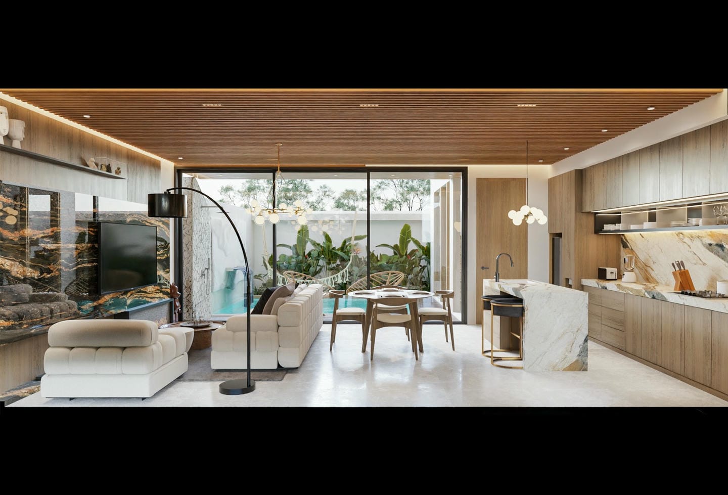 Modern open-plan living room and kitchen with pool view.