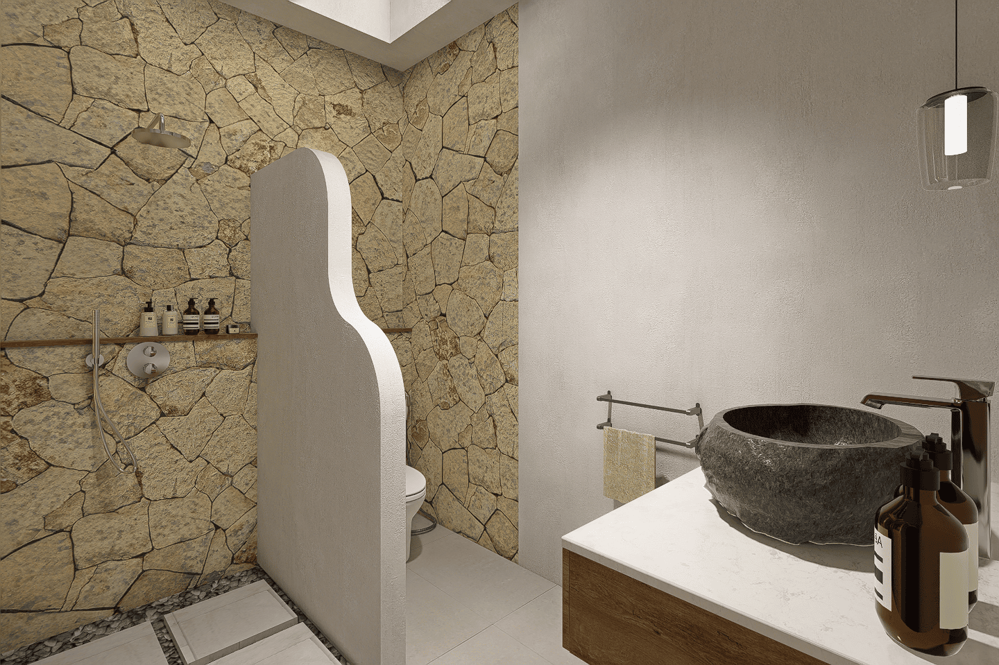 Modern bathroom with stone wall and sink.