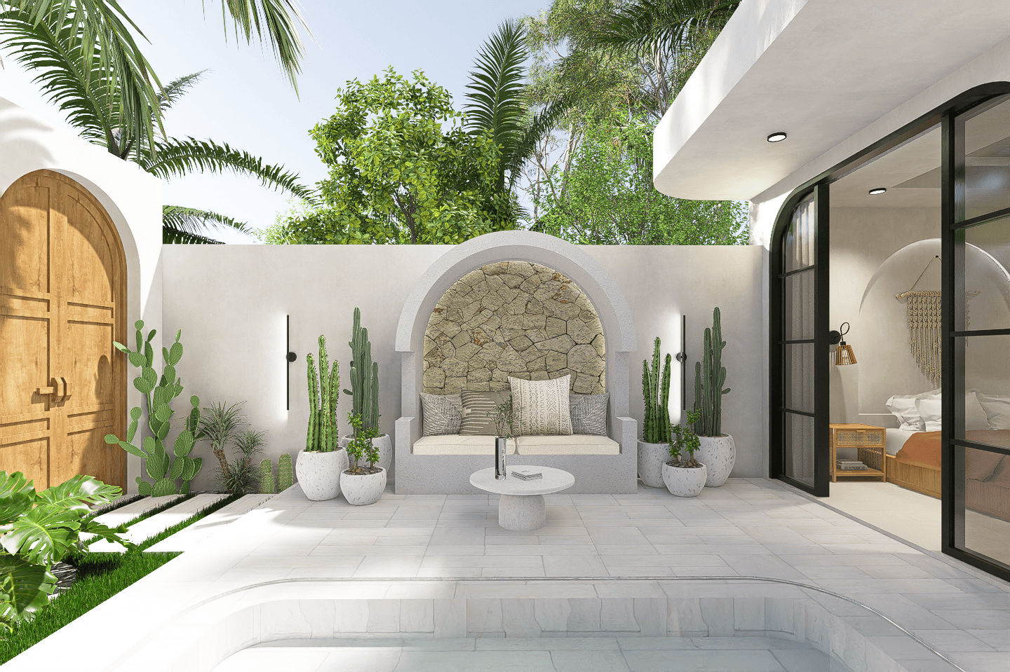 Outdoor patio with stone seating and cacti
