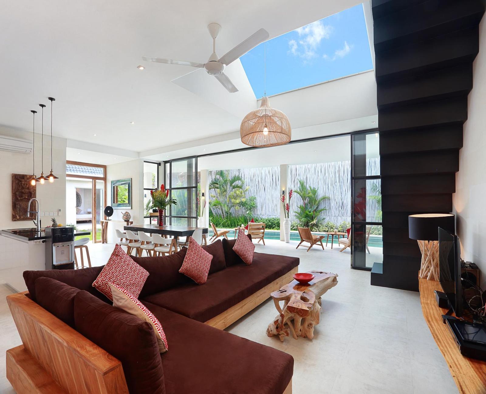 Modern open living room with garden view.