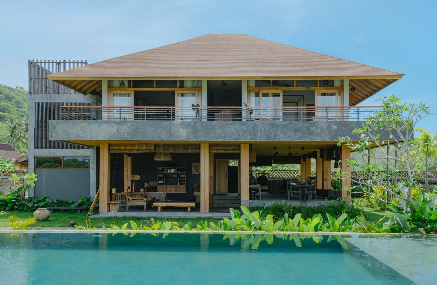 Modern house with pool and lush garden