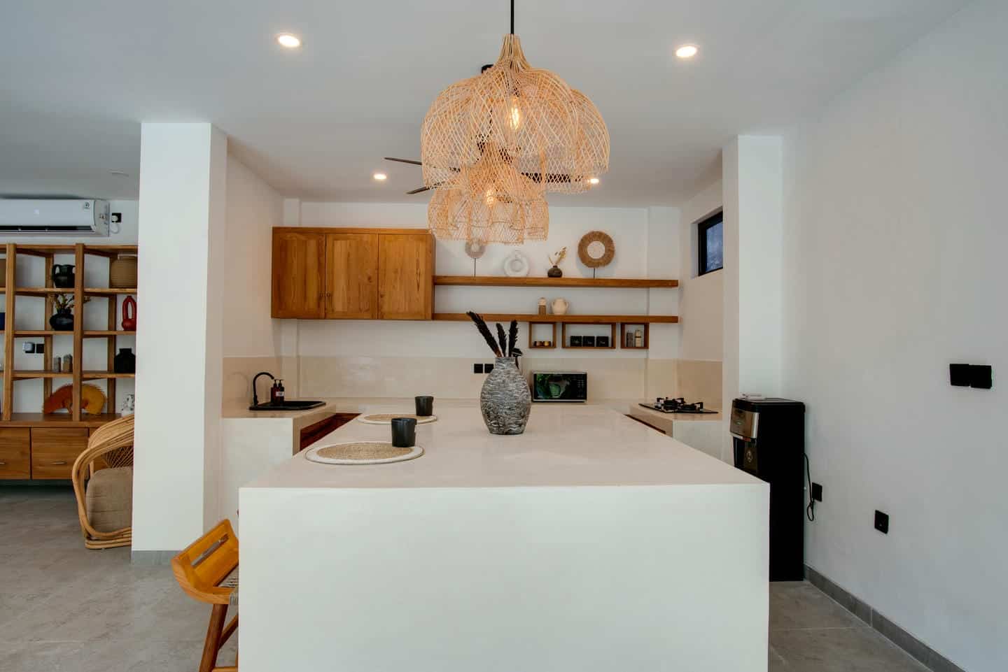 Modern kitchen with wooden cabinets and island.