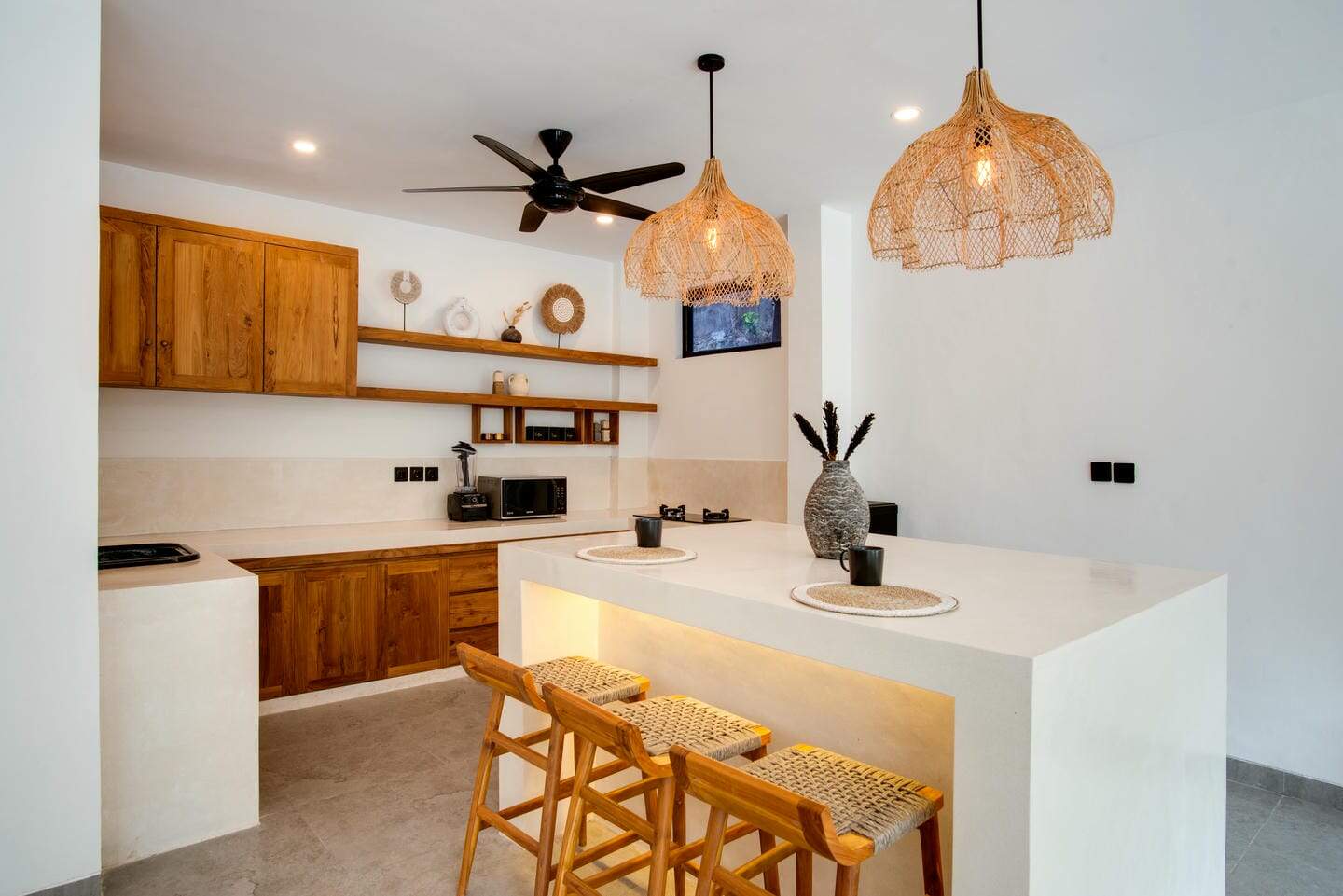 Modern kitchen with wooden cabinets and island.
