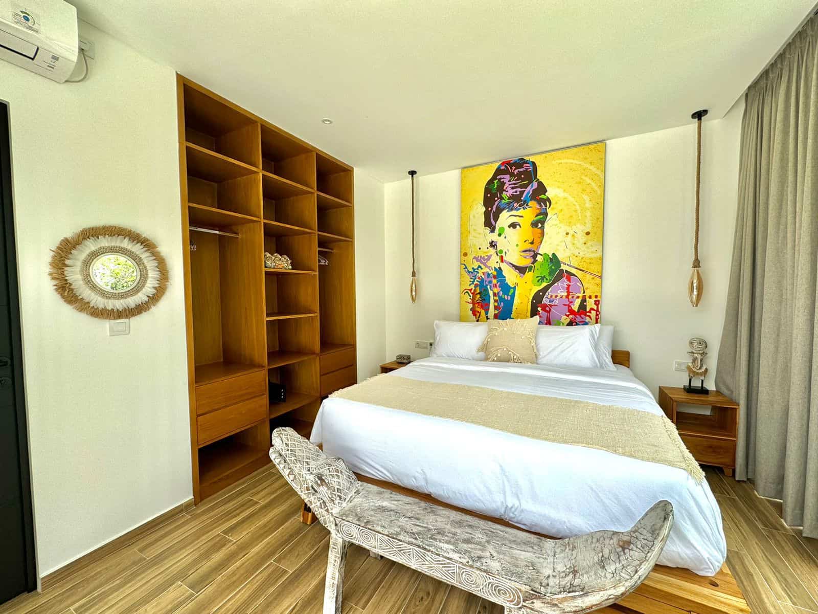 Modern bedroom with colorful pop art painting