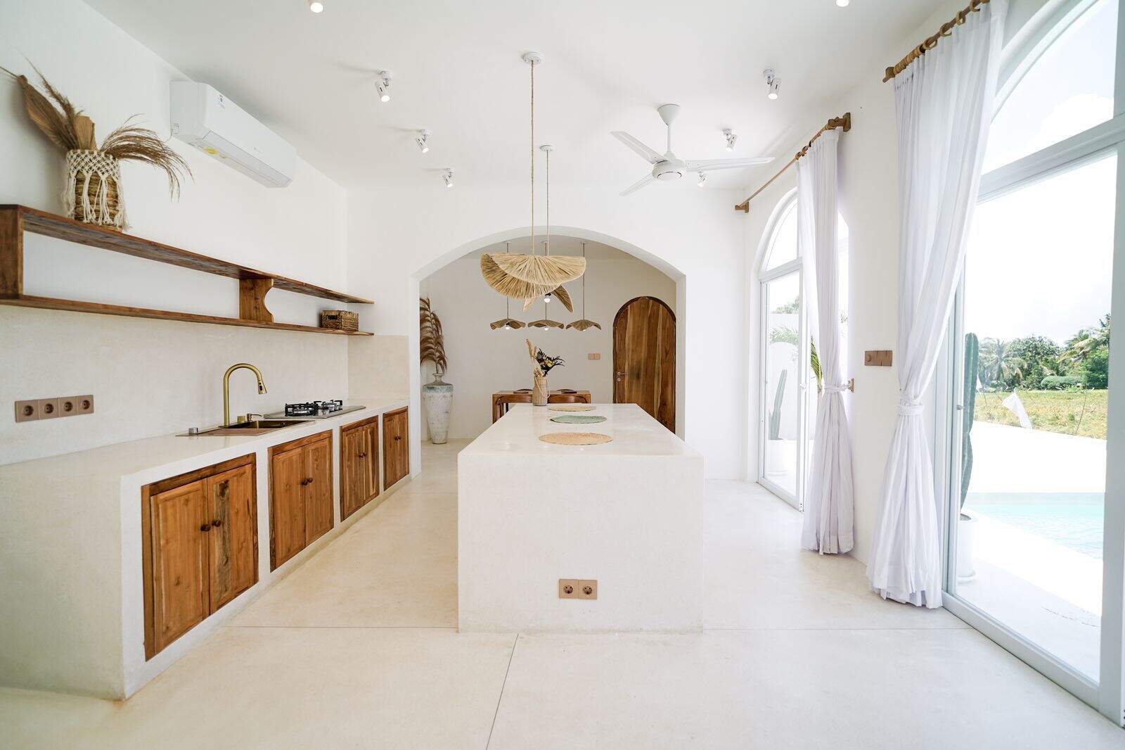 Minimalist kitchen with wooden accents and island