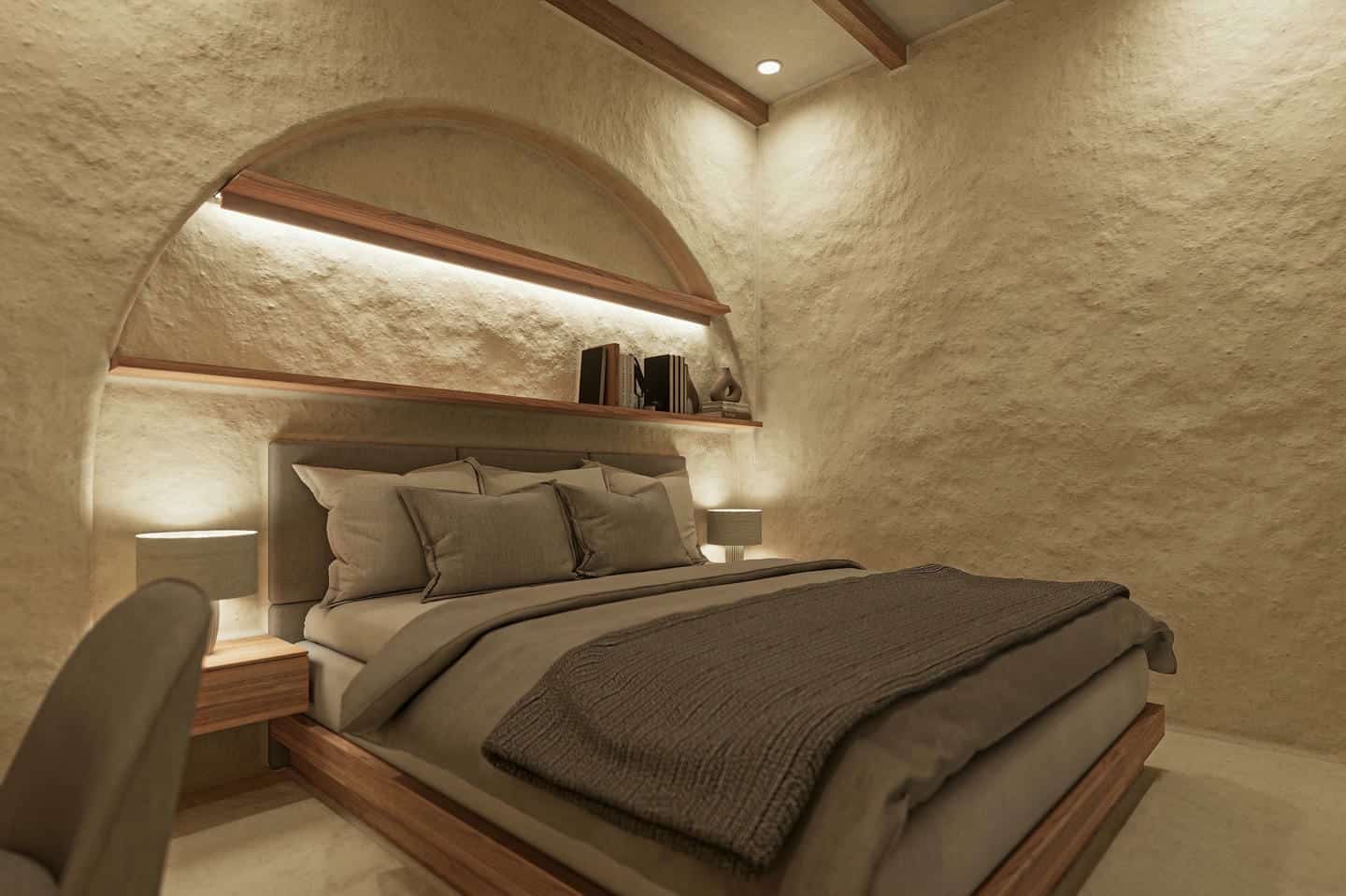 Cozy bedroom with stone walls and wooden accents.