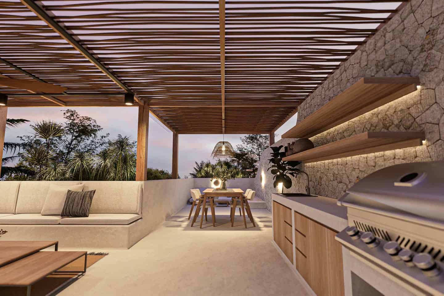 Modern outdoor kitchen with pergola and dining area.