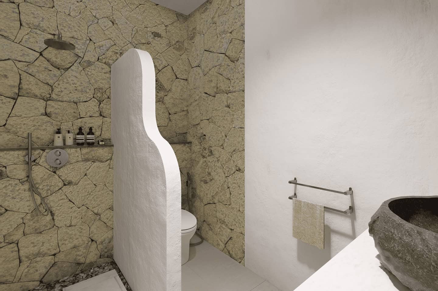 Contemporary bathroom with stone wall and modern fixtures.