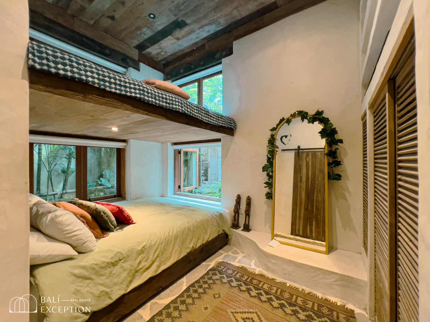 Cozy bedroom with bunk bed and plants