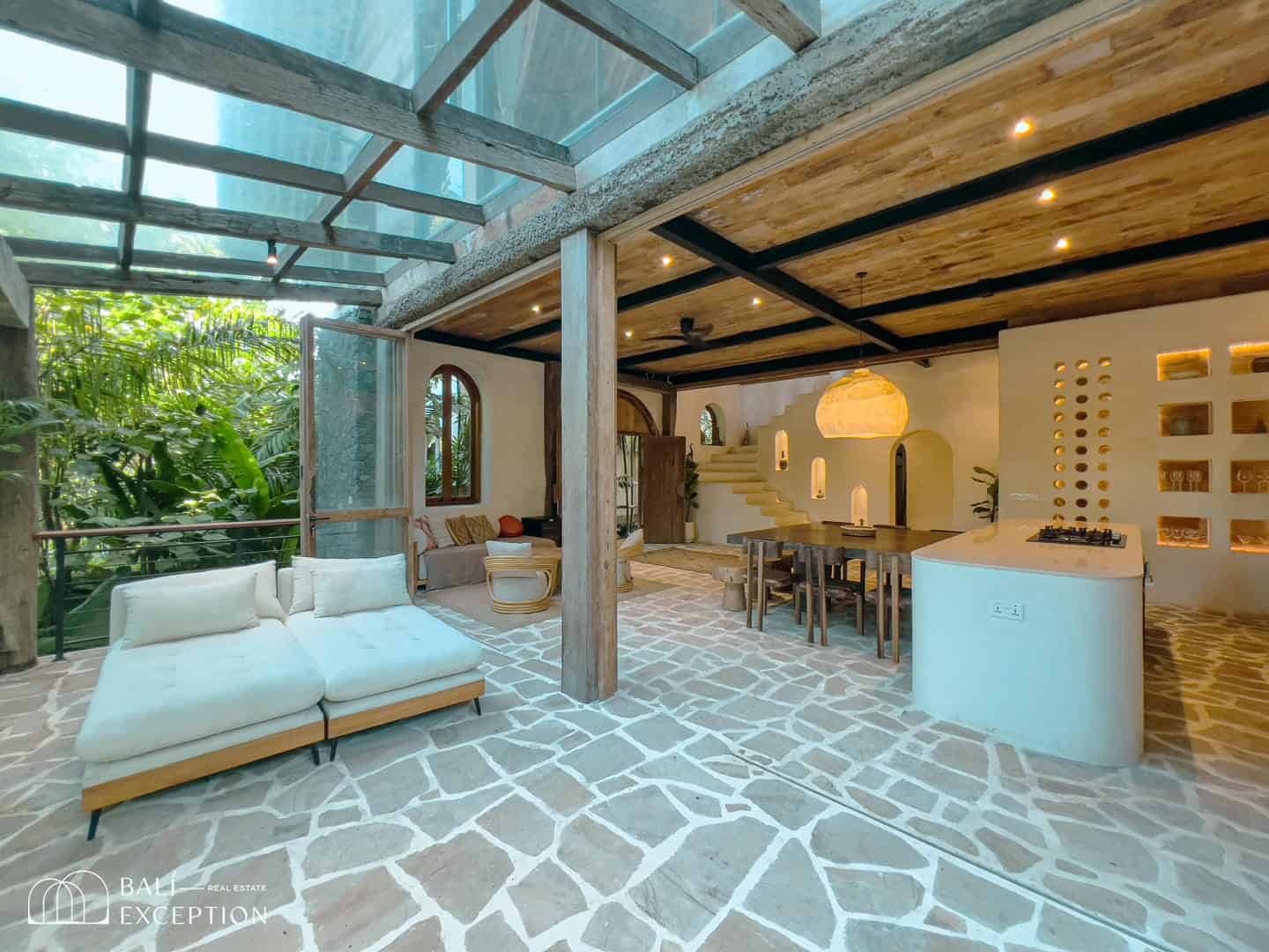 Spacious modern living room with natural light.