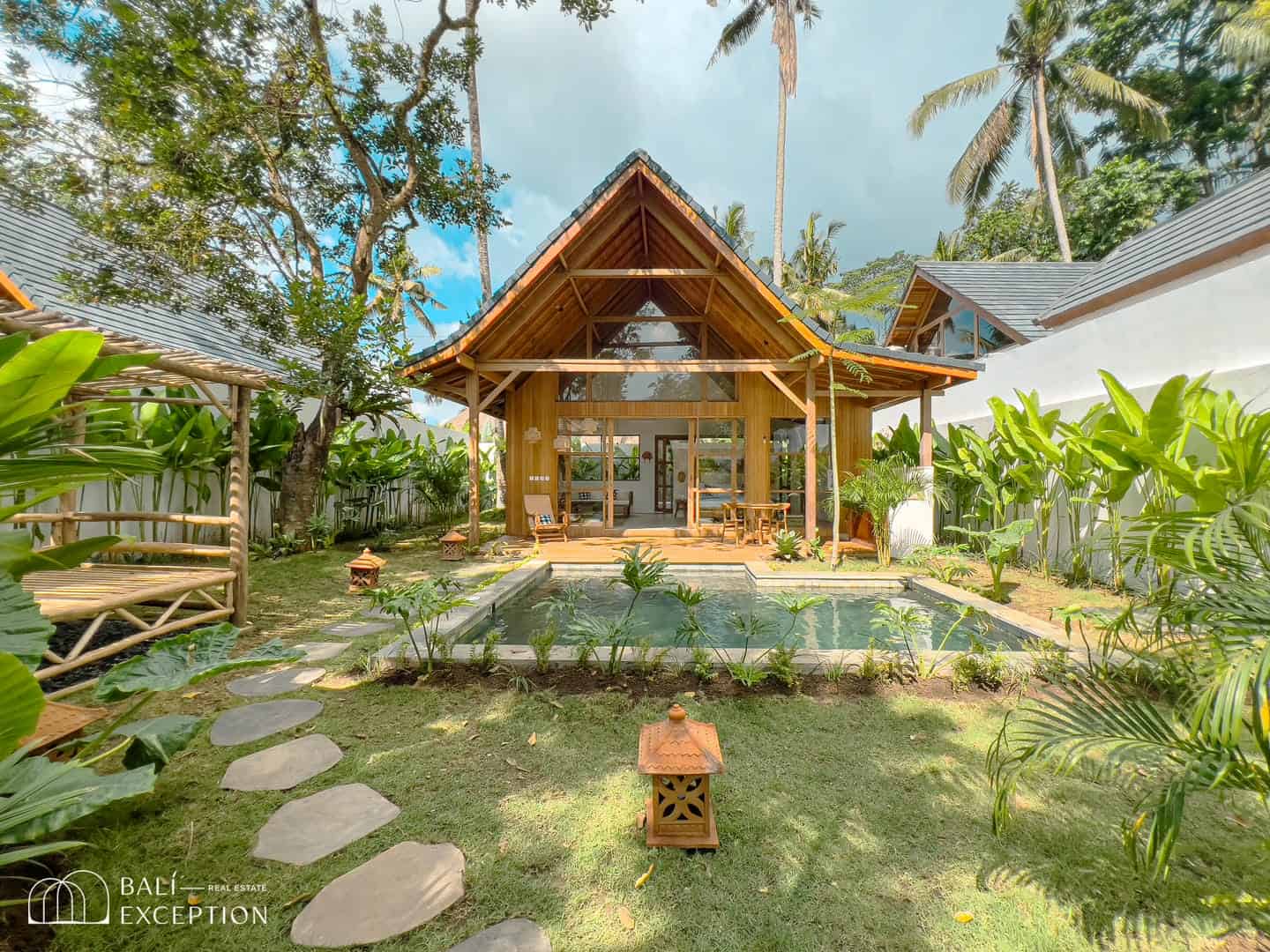 Tropical villa with pool and lush garden
