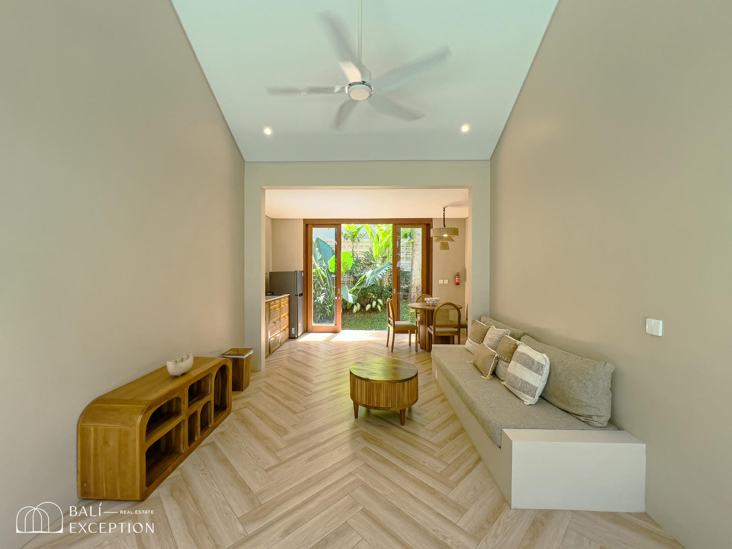 Modern bright living room with neutral decor.